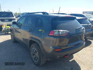 2022 Jeep Cherokee Trailhawk with VIN 1C4PJMBX4ND535037, listed as a IAAI auction lot 41779140 with 49,733 mi miles. Bid and sale history available at carsss.com. Image 3.