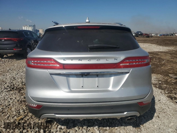 2019 Lincoln MKC Select with VIN 5LMCJ2D93KUL03390, listed as a Copart auction lot 49171235 with 63,417 mi miles and Salvage title. Bid and sale history available at DreamBid. Image 6.