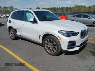 2022 BMW X5 xDrive40i with VIN 5UXCR6C03N9M80327, listed as a IAAI auction lot 41871021 with 35,151 mi miles. Bid and sale history available at carsss.com. Image 1.