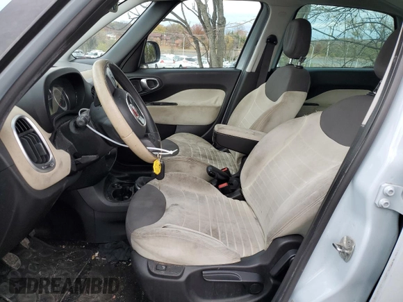 2014 FIAT 500L Easy with VIN ZFBCFABHXEZ009377, listed as a Copart auction lot 81530394 with 149,194 mi miles and Salvage Title. Bid and sale history available at DreamBid. Image 7.