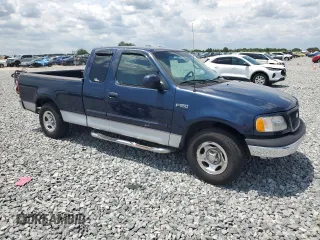 2002 Ford F-150 XL with VIN 1FTRX17222KB05081, listed as a Copart auction lot 56459765 with 126,941 mi miles and Salvage title. Bid and sale history available at DreamBid. Image 4.