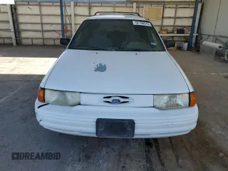1994 Ford Escort z VIN 3FARP15J6RR126053, wystawiony jako Copart lot #52750515 z przebiegiem 81 831 mil mil oraz Tytuł czysty. Historia ofert i sprzedaży dostępna na DreamBid. Obrazek 5.