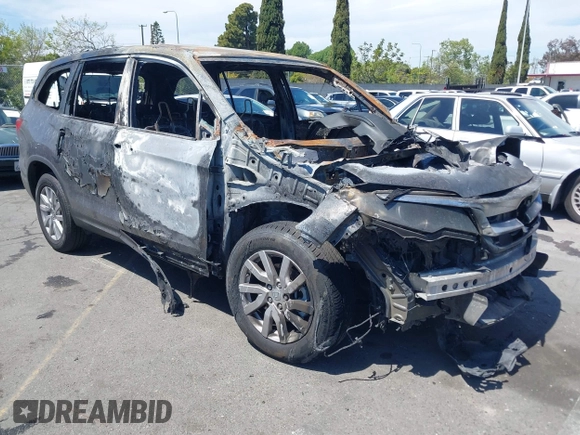 2019 Honda Pilot LX with VIN 5FNYF5H18KB016902, listed as a IAAI auction lot 42003059 with 0 mi miles. Bid and sale history available at carsss.com. Image 1.