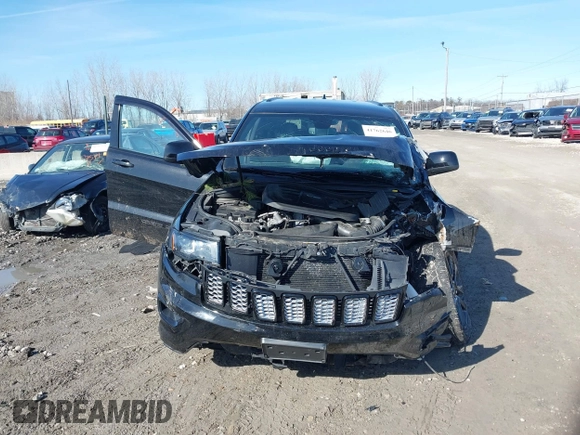 2019 Jeep Grand Cherokee Laredo E with VIN 1C4RJFAG6KC661777, listed as a IAAI auction lot 41762646 with 103,547 mi miles. Bid and sale history available at carsss.com. Image 12.