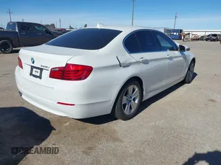 2013 BMW 5 Series 528i with VIN WBAXG5C59DDY32432, listed as a IAAI auction lot 41230673 with 103,069 mi miles and . Bid and sale history available at carsss.com. Image 4.