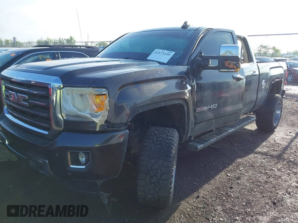 2015 GMC Sierra 2500HD SLT with VIN 1GT12ZE84FF553371, listed as a IAAI auction lot 42173249 with 247,703 mi miles and . Bid and sale history available at DreamBid. Image 2.