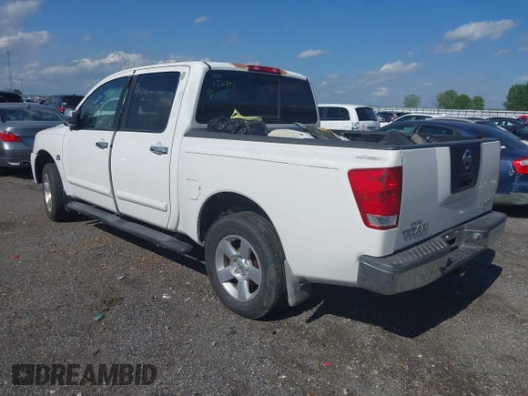 2004 Nissan Titan LE with VIN 1N6AA07A04N561241, listed as a IAAI auction lot 42180597 with 166,529 mi miles and . Bid and sale history available at DreamBid. Image 3.