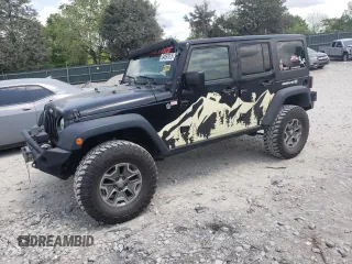 2014 Jeep Wrangler Unlimited Rubicon with VIN 1C4BJWFGXEL291187, listed as a Copart auction lot 54897675 with 227,478 mi miles and Salvage title. Bid and sale history available at DreamBid. Image 1.