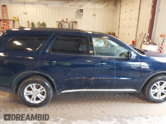 2012 Dodge Durango SXT with VIN 1C4RDJAG9CC169871, listed as a IAAI auction lot 42558583 with 259,113 mi miles and . Bid and sale history available at DreamBid. Image 6.