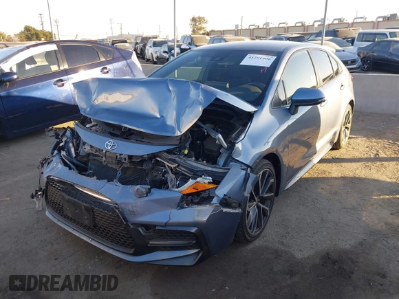 2022 Toyota Corolla SE with VIN JTDS4MCE9NJ082078, listed as a IAAI auction lot 41291406 with 57,202 mi miles and . Bid and sale history available at DreamBid. Image 2.