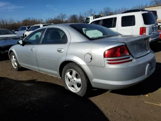 2006 Dodge Stratus SXT z VIN 1B3EL46X46N221753, wystawiony jako Copart lot #79672984 z przebiegiem 168 863 mil mil oraz Czysty tytuł • Clean title. Historia ofert i sprzedaży dostępna na DreamBid. Obrazek 2.