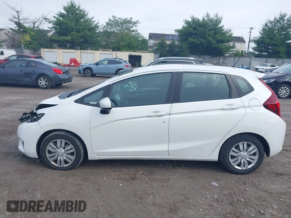 2015 Honda Fit LX with VIN 3HGGK5H51FM752870, listed as a IAAI auction lot 42378020 with 109,698 mi miles and . Bid and sale history available at DreamBid. Image 14.