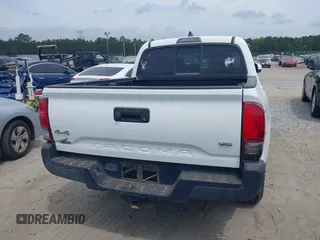 2022 Toyota Tacoma SR with VIN 3TYCZ5AN9NT098903, listed as a IAAI auction lot 42088505 with 93,000 mi miles and . Bid and sale history available at DreamBid. Image 16.