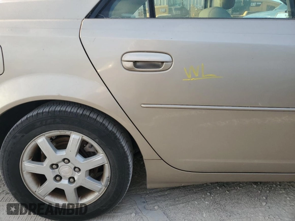 2005 Cadillac CTS with VIN 1G6DP567250181529, listed as a Copart auction lot 76840944 with 64,175 mi miles and Salvage Title. Bid and sale history available at carsss.com. Image 12.