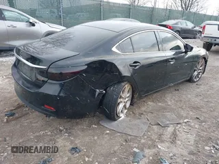 2017 Mazda Mazda6 Touring with VIN JM1GL1V5XH1117820, listed as a IAAI auction lot 41617395 with 117,081 mi miles. Bid and sale history available at carsss.com. Image 4.