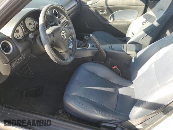 2004 Mazda MX-5 Miata LS with VIN JM1NB353640402308, listed as a Copart auction lot 84568244 with 50,287 mi miles and Salvage title. Bid and sale history available at DreamBid. Image 7.