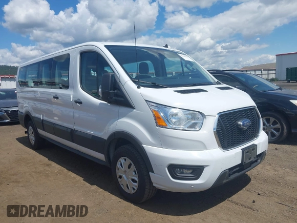 2021 Ford Transit Passenger XL z VIN 1FBAX2Y87MKA31170, wystawiony jako IAAI lot #42348150 z przebiegiem 60 124 mil mil oraz . Historia ofert i sprzedaży dostępna na DreamBid. Obrazek 1.