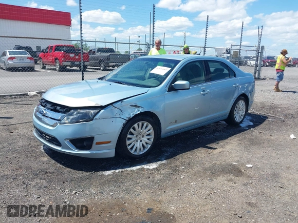 2010 Ford Fusion Hybrid z VIN 3FADP0L33AR385001, wystawiony jako IAAI lot #42074965 z przebiegiem 195 962 mil mil oraz . Historia ofert i sprzedaży dostępna na DreamBid. Obrazek 17.
