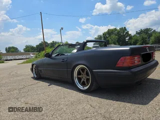 1999 Mercedes-Benz SL 500 with VIN WDBFA68FXXF184548, listed as a Copart auction lot 63814775 with 133,681 mi miles and Clean title. Bid and sale history available at DreamBid. Image 3.