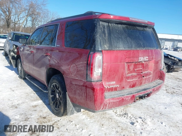 2015 GMC Yukon SLE with VIN 1GKS2AKC2FR514005, listed as a IAAI auction lot 41292783 with 129,413 mi miles. Bid and sale history available at carsss.com. Image 3.
