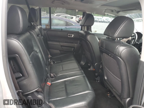 2013 Honda Pilot Touring z VIN 5FNYF4H99DB083396, wystawiony jako Copart lot #58728975 z przebiegiem Nie podano mil oraz Czysty tytuł • Clean title. Historia ofert i sprzedaży dostępna na DreamBid. Obrazek 11.