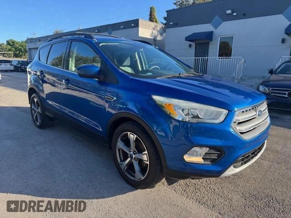 2017 Ford Escape SE with VIN 1FMCU0GD2HUA19806, listed as a Copart auction lot 54800235 with 97,697 mi miles and Salvage Title. Bid and sale history available at carsss.com. Image 4.