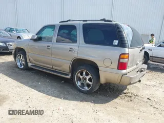2002 GMC Yukon Denali z VIN 1GKEK63U52J202688, wystawiony jako IAAI lot #41778920 z przebiegiem 354 202 mil mil oraz . Historia ofert i sprzedaży dostępna na DreamBid. Obrazek 3.