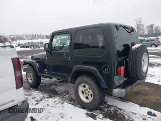 2005 Jeep Wrangler X with VIN 1J4FA39S55P353131, listed as a IAAI auction lot 41575949 with 154,026 mi miles and . Bid and sale history available at DreamBid. Image 14.