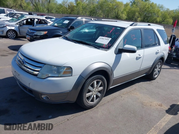 2008 Ford Taurus X SEL with VIN 1FMDK05W98GA41945, listed as a IAAI auction lot 42067959 with 157,896 mi miles and . Bid and sale history available at DreamBid. Image 2.