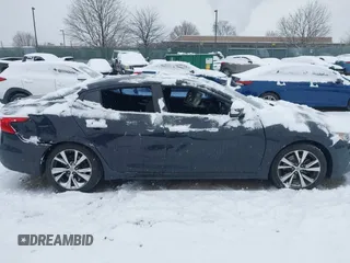 2017 Nissan Maxima SV with VIN 1N4AA6AP5HC418537, listed as a IAAI auction lot 41260140 with 56,140 mi miles. Bid and sale history available at carsss.com. Image 12.