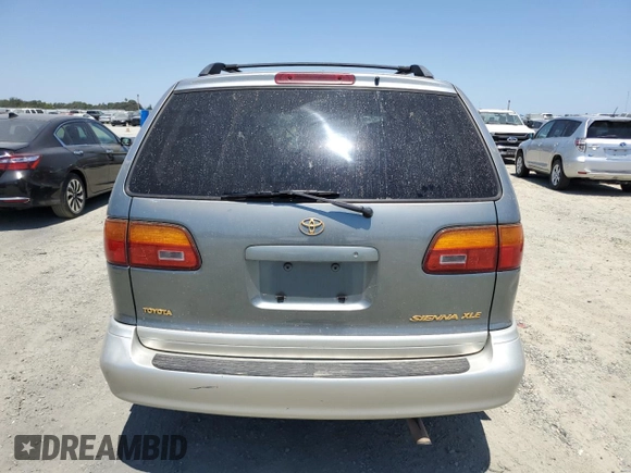 1998 Toyota Sienna LE with VIN 4T3ZF13C4WU064791, listed as a Copart auction lot 61411865 with 218,835 mi miles and Salvage title. Bid and sale history available at DreamBid. Image 6.