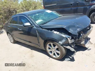 2014 Cadillac ATS Standard RWD with VIN 1G6AA5RX9E0164422, listed as a IAAI auction lot 42568568 with 72,173 mi miles and . Bid and sale history available at DreamBid. Image 1.
