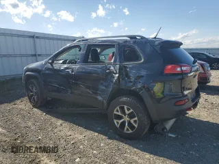 2014 Jeep Cherokee Trailhawk с VIN 1C4PJMBS4EW111401, выставлен на аукционе Copart как лот 57998735 с пробегом Не указан миль и Списание • Salvage title. История ставок и продаж доступна на DreamBid. Изображение 2.