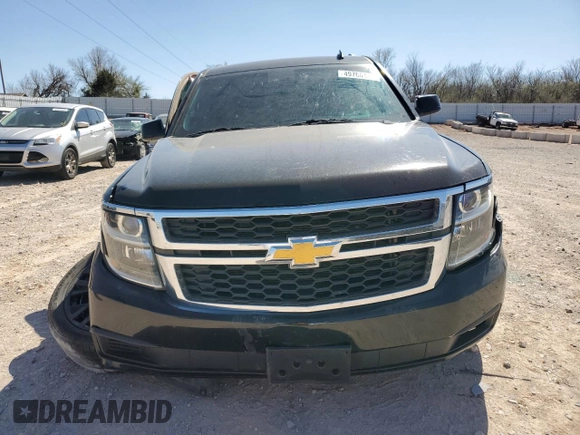 2015 Chevrolet Tahoe LT with VIN 1GNSCBKC0FR193894, listed as a Copart auction lot 49700495 with 179,127 mi miles and Salvage Title. Bid and sale history available at DreamBid. Image 5.