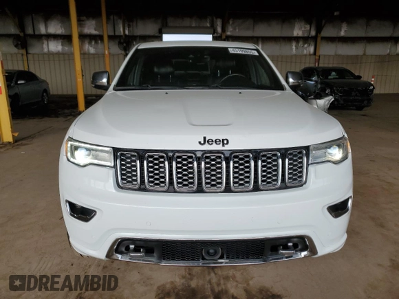 2017 Jeep Grand Cherokee Overland with VIN 1C4RJFCG2HC834328, listed as a Copart auction lot 45199855 with 87,061 mi miles and Salvage Title. Bid and sale history available at carsss.com. Image 5.