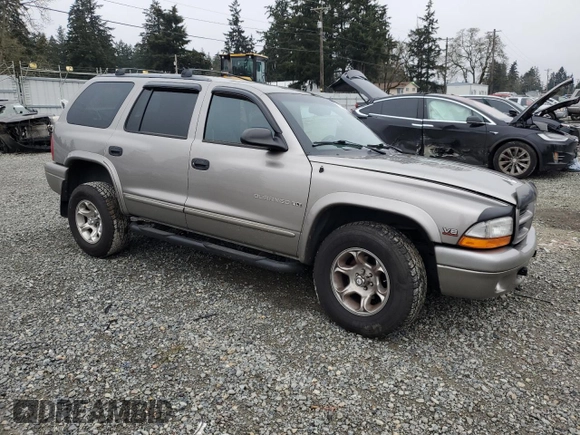 2000 Dodge Durango with VIN 1B4HS28Z6YF121861, listed as a Copart auction lot 87669175 with 115,990 mi miles and Salvage Title. Bid and sale history available at DreamBid. Image 4.