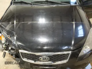 2010 Kia Rio with VIN KNADH4B37A6641845, listed as a Copart auction lot 51861215 with 163,894 mi miles and Salvage Title. Bid and sale history available at DreamBid. Image 11.