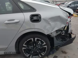2024 Kia K5 GT-Line z VIN 5XXG64J29RG237148, wystawiony jako IAAI lot #41396574 z przebiegiem 22 926 mil mil oraz . Historia ofert i sprzedaży dostępna na DreamBid. Obrazek 12.