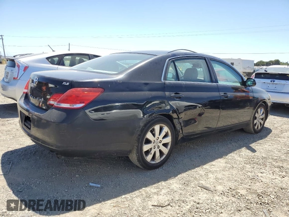 2007 Toyota Avalon XL z VIN 4T1BK36B37U221068, wystawiony jako Copart lot #58092985 z przebiegiem 168 743 mil mil oraz Szkoda całkowita • Salvage title. Historia ofert i sprzedaży dostępna na DreamBid. Obrazek 3.