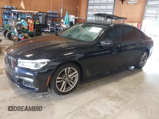 2019 BMW 7 Series 750i xDrive with VIN WBA7F2C51KB239044, listed as a IAAI auction lot 42756026 with 65,028 mi miles and . Bid and sale history available at DreamBid. Image 2.