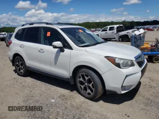 2015 Subaru Forester XT Touring with VIN JF2SJGUC4FH452824, listed as a Copart auction lot 56219615 with 127,328 mi miles and Salvage title. Bid and sale history available at DreamBid. Image 4.