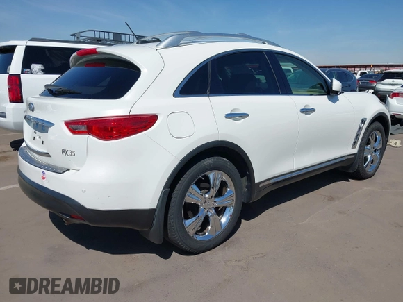 2011 Infiniti FX z VIN JN8AS1MW8BM734422, wystawiony jako IAAI lot #41896612 z przebiegiem 153 404 mil mil oraz . Historia ofert i sprzedaży dostępna na DreamBid. Obrazek 4.