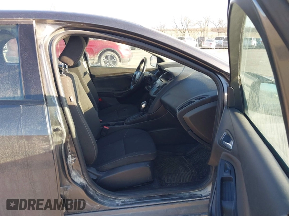 2016 Ford Focus SE with VIN 1FADP3F27GL374188, listed as a IAAI auction lot 41738121 with 125,229 mi miles. Bid and sale history available at carsss.com. Image 5.
