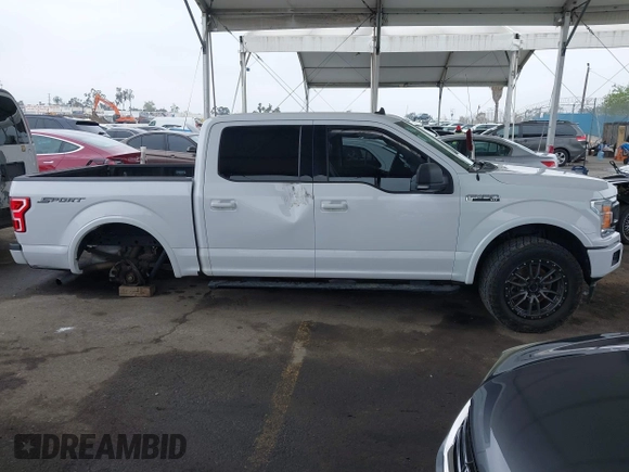 2019 Ford F-150 XL with VIN 1FTEW1CPXKKC50999, listed as a IAAI auction lot 41862139 with 61,375 mi miles and . Bid and sale history available at DreamBid. Image 14.