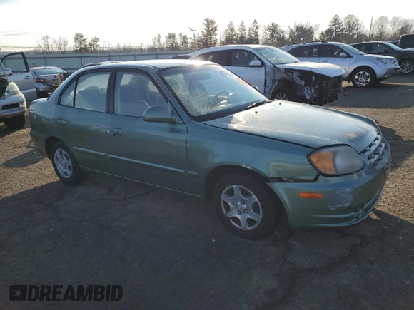 2005 Hyundai Accent GLS with VIN KMHCG45C85U588700, listed as a Copart auction lot 42792775 with 91,924 mi miles and Clean Title. Bid and sale history available at carsss.com. Image 4.