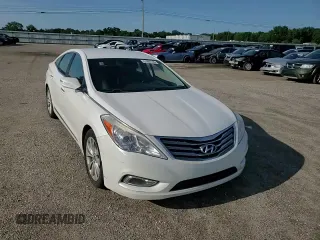 2014 Hyundai Azera z VIN KMHFG4JG6EA342493, wystawiony jako Copart lot #61897745 z przebiegiem 120 519 mil mil oraz Szkoda całkowita • Salvage title. Historia ofert i sprzedaży dostępna na DreamBid. Obrazek 13.