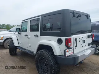 2015 Jeep Wrangler Unlimited Sahara с VIN 1C4BJWEG1FL506393, выставлен на аукционе IAAI как лот 42326900 с пробегом 100 538 миль миль и . История ставок и продаж доступна на DreamBid. Изображение 3.