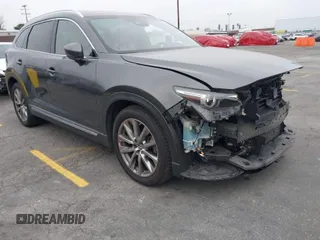 2018 Mazda CX-9 Grand Touring z VIN JM3TCADY7J0213286, wystawiony jako IAAI lot #42041967 z przebiegiem 100 316 mil mil oraz . Historia ofert i sprzedaży dostępna na DreamBid. Obrazek 1.