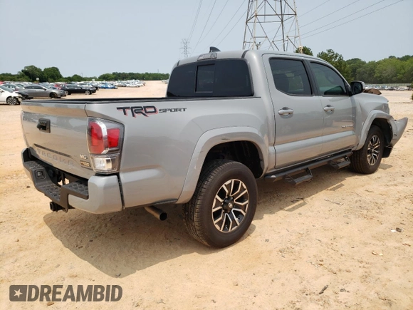 2021 Toyota Tacoma SR5 z VIN 5TFAZ5CN2MX099562, wystawiony jako Copart lot #59329335 z przebiegiem 23 570 mil mil oraz Czysty tytuł • Clean title. Historia ofert i sprzedaży dostępna na DreamBid. Obrazek 3.