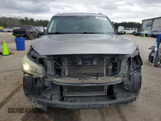 2012 Infiniti QX56 8-passenger with VIN JN8AZ2ND4C9715207, listed as a Copart auction lot 43283955 with 191,935 mi miles and Salvage title. Bid and sale history available at DreamBid. Image 5.